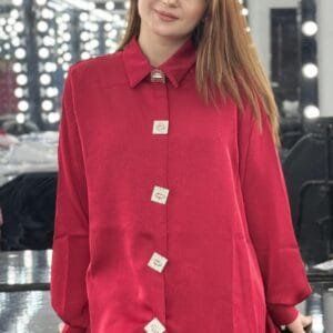 Maroon silk loose-fit ladies shirt with square liver-colored metal buttons, round neck, 30 inches long, free size fits up to body size 50