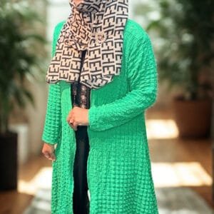 women wearing green shrug